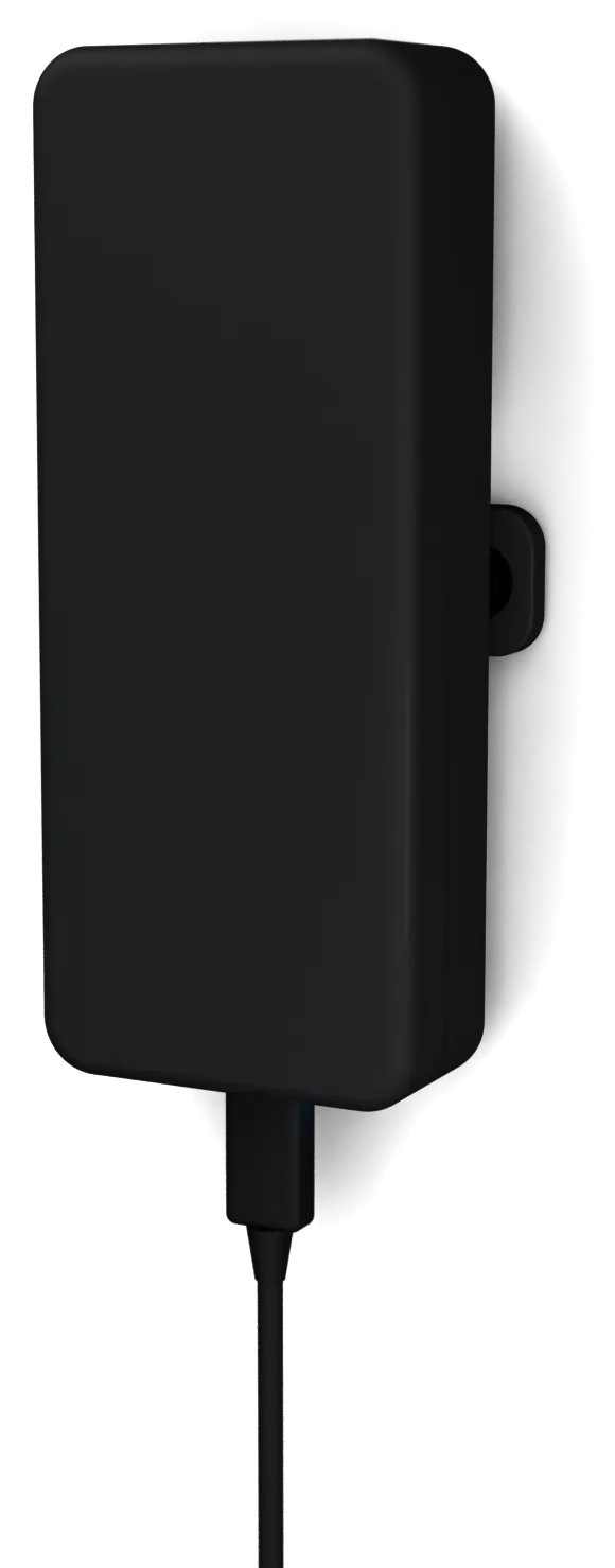 The CabinPulse device mounted on a wall, plugged in