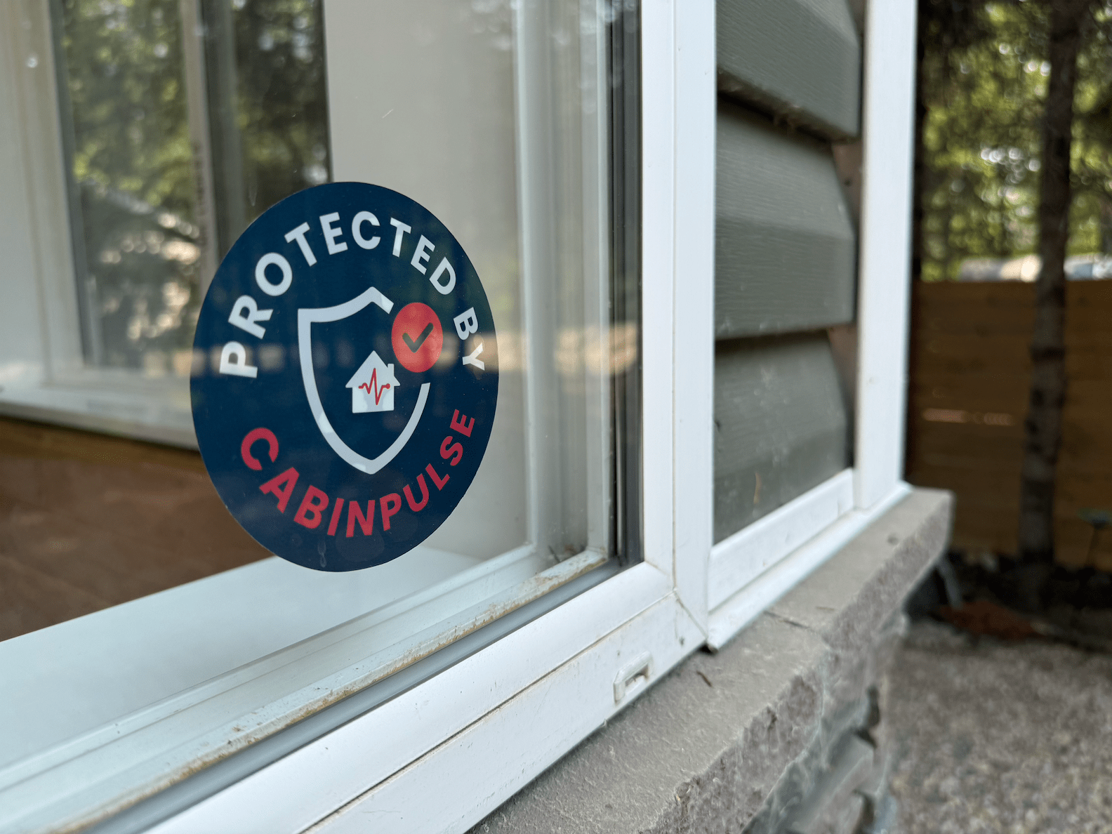 CabinPulse window sticker on a cabin